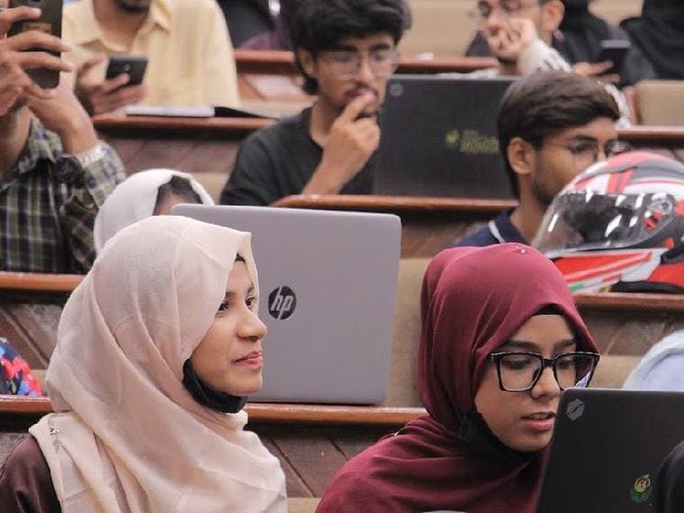 Attendees at their laptops during the Session 6 workshop
